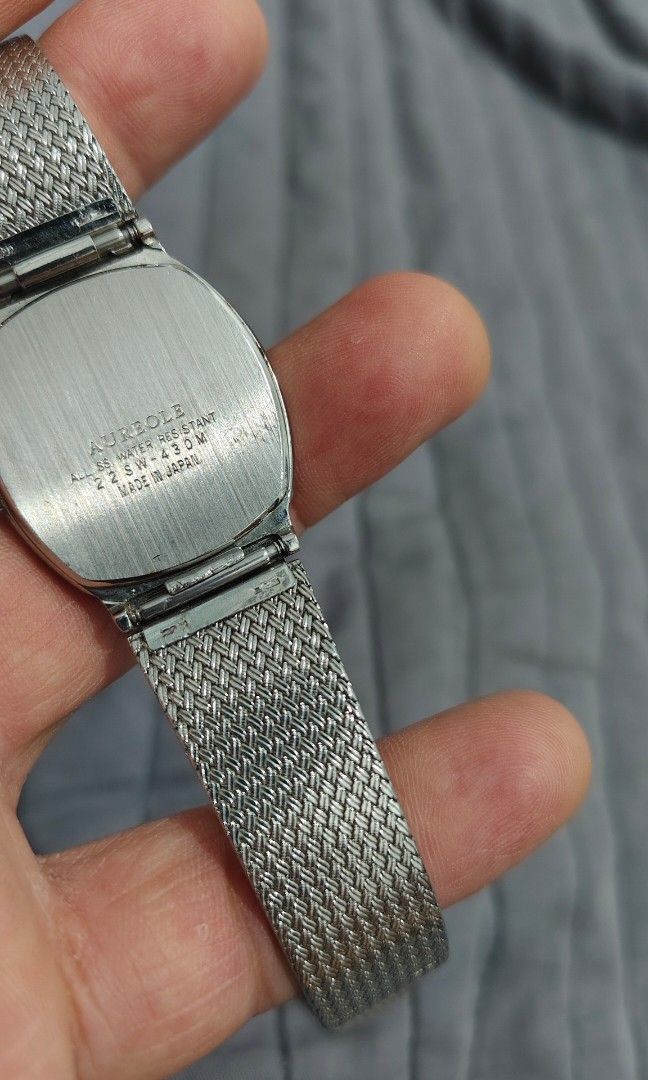 Vintage Aureole ( Made in Japan ) (Category: Women's Watches) located in Cebu City. Submitted by aceoftime (Listing ID 1433948969, Image 3). Description: In good working condition Made in Japan Ref: 32SW-430M Features silver-tone finish & Integrated mesh bracelet Elegant tonneau-shaped silver-tone case with textured, patterned bezel A nice linen textured dial with minimalisr hour markers and hands Millanese atyle band that blends seamlessly into 