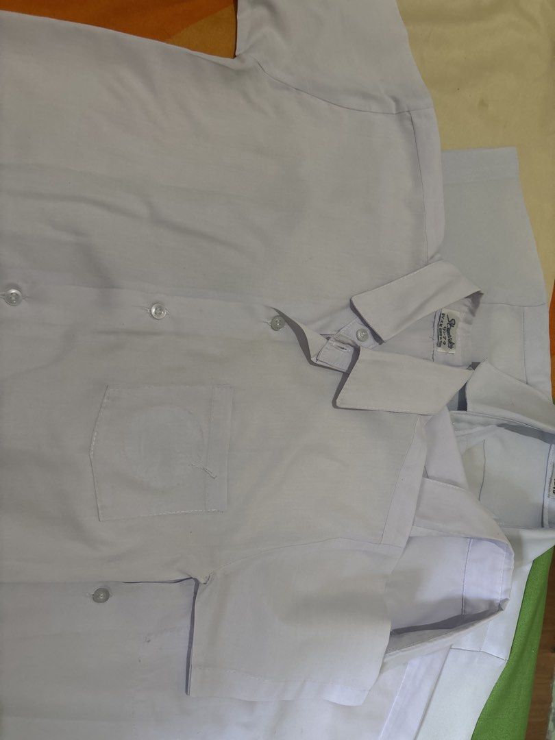 White School Uniform Shirt (Category: Tshirts & Polo Shirts ) located in Antipolo. Submitted by seylecious (Listing ID 1433790919, Image 2). Description: Only php200 for 3 pcs - Used uniform fit for grade 2/3 student - White school uniform shirt (polo jacket) - Collared neckline - Short sleeves - Chest pocket (1 no pocket as patch has been removed) - Button-down closure - Features brand label - Ideal for school wear.