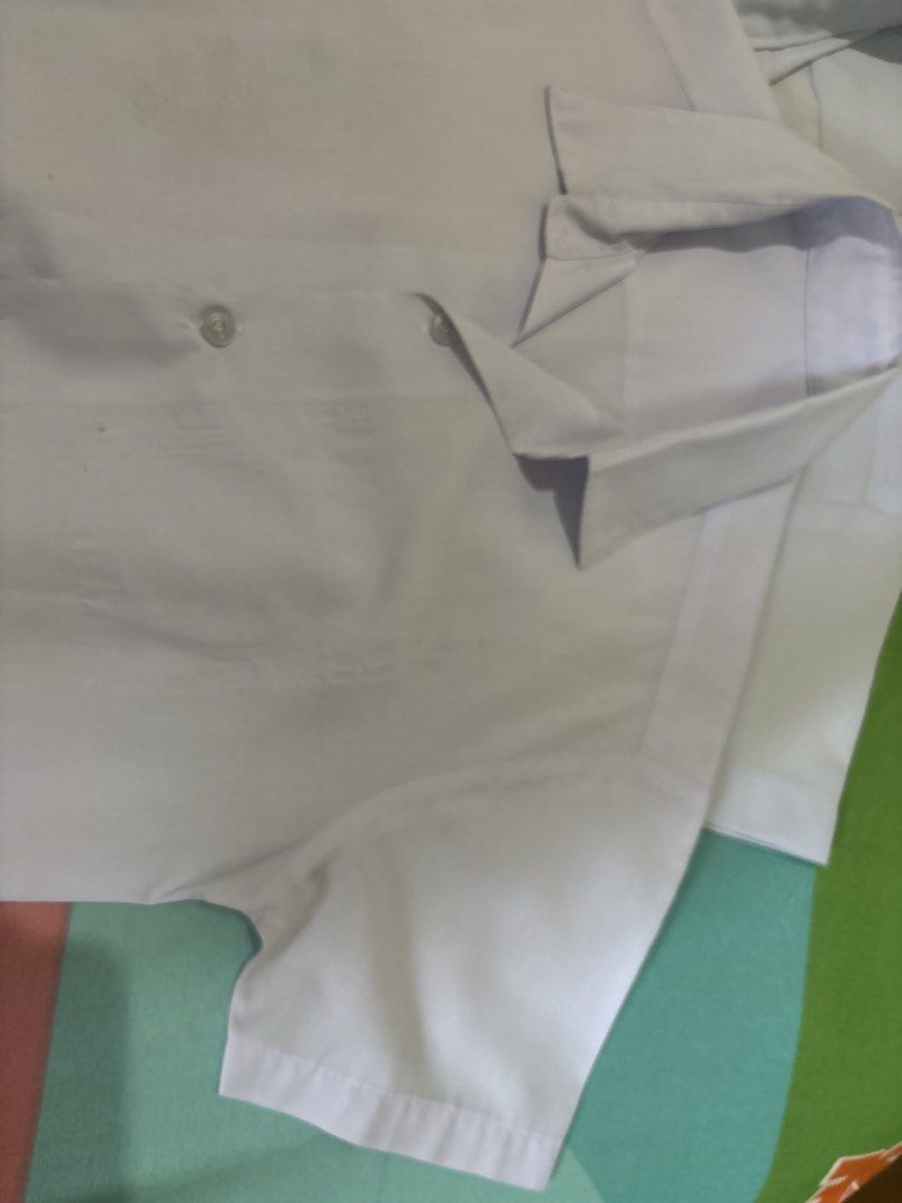 White School Uniform Shirt (Category: Tshirts & Polo Shirts ) located in Antipolo. Submitted by seylecious (Listing ID 1433790919, Image 3). Description: Only php200 for 3 pcs - Used uniform fit for grade 2/3 student - White school uniform shirt (polo jacket) - Collared neckline - Short sleeves - Chest pocket (1 no pocket as patch has been removed) - Button-down closure - Features brand label - Ideal for school wear.