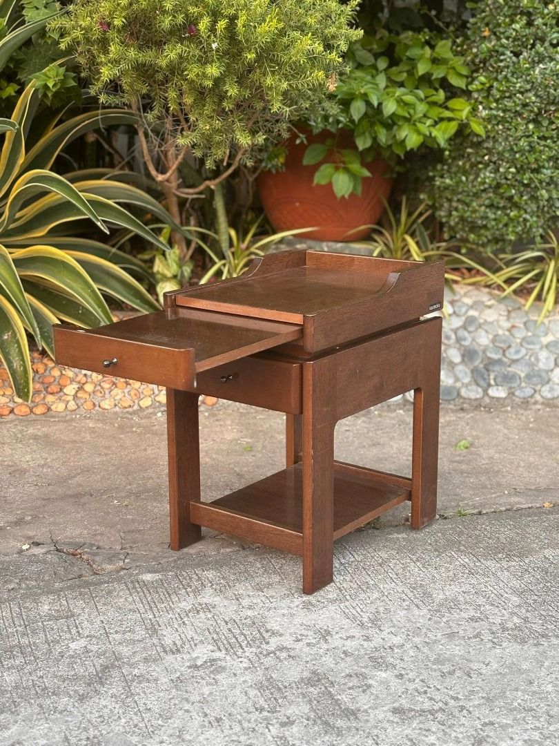 Wooden Nightstand with Power Outlets and Extendable Table (Category: Tables & Sets) located in Manila. Submitted by kahoycollective (Listing ID 1433810960, Image 1). Description: Wooden Nightstand with Power Outlets and Extendable Table Before: Php 1800 Now: Php 1500 This wooden nightstand 🔌🌙 is designed for convenience, with built-in power outlets and sliding drawers. Keep your essentials within reach while charging your devices! Condition: 9/