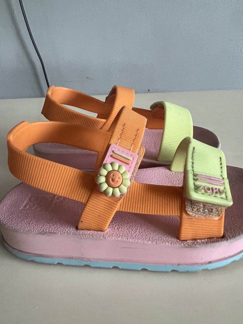 Zaxy Nina Sandals - Size 23/24 (Category: Babies & Kids Fashion) located in Marikina City. Submitted by prelovedreeses (Listing ID 1433864953, Image 2). Description: - Zaxy Nina sandals - Size: 23/24 BRA / 10 USA - Color: Pink base with orange and green straps - Features a flower detail - Condition: Some wear on soles - Ideal for your little one's summer activities.