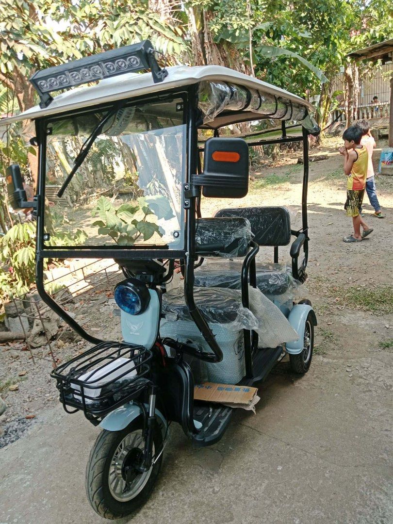 3 wheels electric bike (Category: Bicycles) located in Quezon City. Submitted by adarico (Listing ID 1434059966, Image 2). Description: ONHAND NA ANG BUDGET ETRIKE NA NAKA 1,200watts na 😎 ⭐️ SKYLAND E-TRIKE 1,200WATTS MOTOR 🆓CROW LIGHT MINI FAN 🆓 FREE TRAPAL 🆓FREE AUTOMATIC WIPER 🆓FREE SIDE MIRROR 🆓FREE ROOF 🆓with Certificate of ownership Inclusions 💥 📍Drum Brake 📍3 wheels 3-4 seaters 📍with ROOF and WINDSHIELD 📍Keyless Feature 📍 Auto
