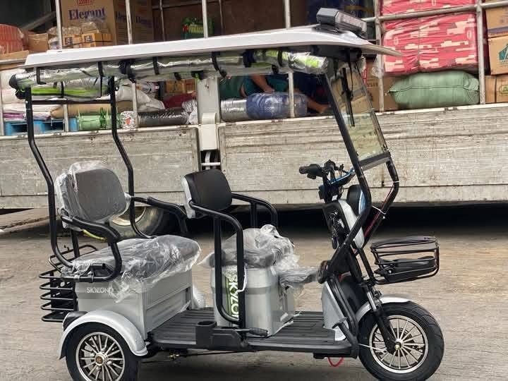 3 wheels electric bike (Category: Bicycles) located in Quezon City. Submitted by adarico (Listing ID 1434059966, Image 3). Description: ONHAND NA ANG BUDGET ETRIKE NA NAKA 1,200watts na 😎 ⭐️ SKYLAND E-TRIKE 1,200WATTS MOTOR 🆓CROW LIGHT MINI FAN 🆓 FREE TRAPAL 🆓FREE AUTOMATIC WIPER 🆓FREE SIDE MIRROR 🆓FREE ROOF 🆓with Certificate of ownership Inclusions 💥 📍Drum Brake 📍3 wheels 3-4 seaters 📍with ROOF and WINDSHIELD 📍Keyless Feature 📍 Auto