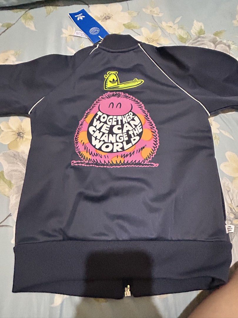 Adidas Kids Tracksuit Set (Category: Babies & Kids Fashion) located in Quezon City. Submitted by wonderrv18 (Listing ID 1434125382, Image 2). Description: - Adidas navy blue tracksuit set - Color: Navy blue - Jacket features: - Zip closure - White stripes on sleeves - Graphic on the back - Pants feature: - White stripes on sides - Graphic on left leg - Includes original tag - size 2-3 on tag.