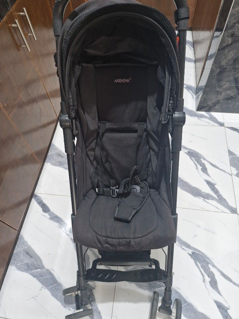 Akeeva Stroller (Category: Strollers) located in Manila. Submitted by mobilelegendsmythic (Listing ID 1434042772, Image 1). Description: - Black Akeeva stroller - Includes sunshade for sun protection - Equipped with a safety harness - Convenient storage pockets - Foldable for easy storage and transport - Padded seat for baby's comfort - Durable black frame and wheels Used. Akeeva Stroller Good condition With flaws Missing arm rest Location Taytay