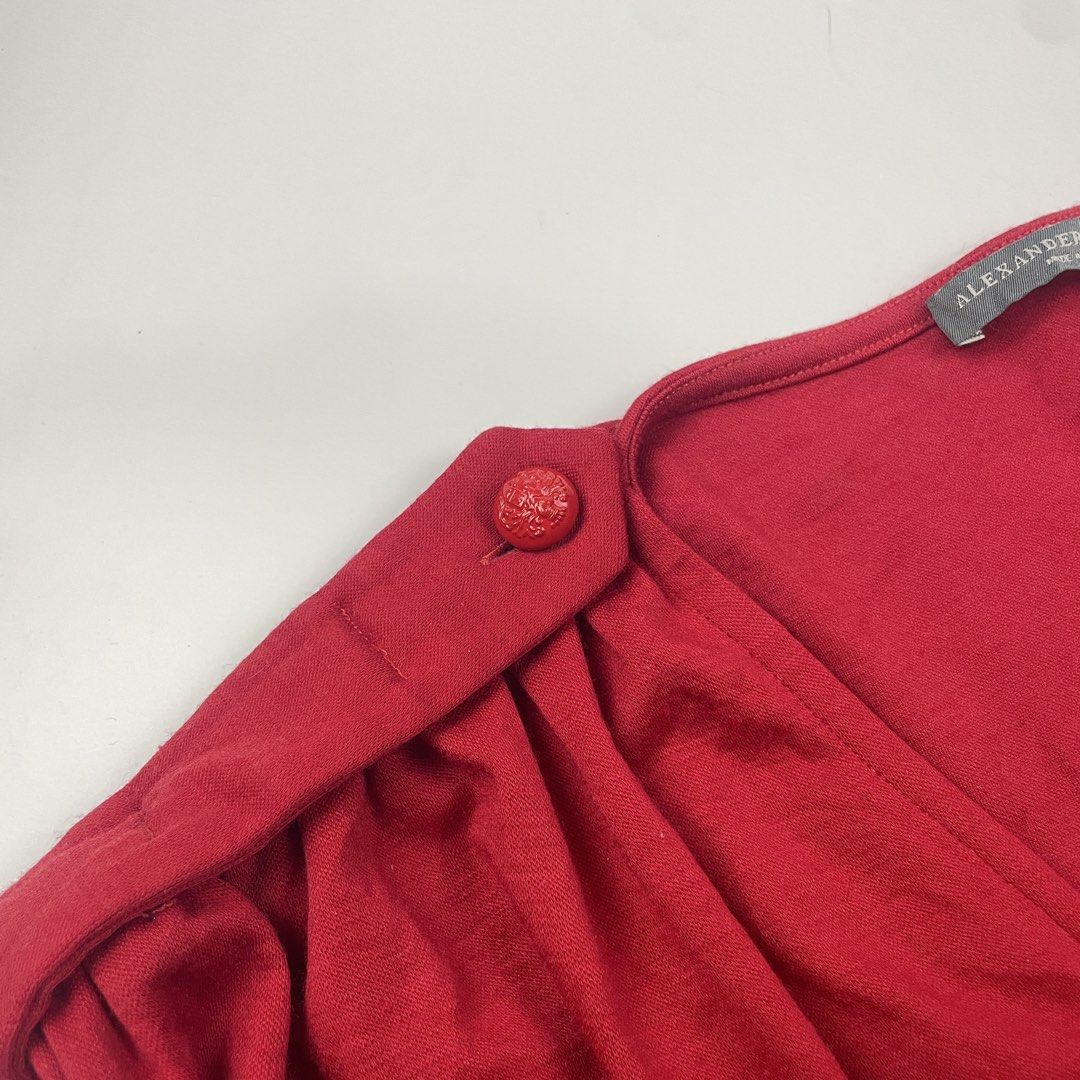 Alexander Mcqueen Draped Asymmetric Top (Category: Luxury Apparel) located in Bacolod City. Submitted by caast.archives (Listing ID 1434112483, Image 3). Description: Alexander Mcqueen Draped Asymmetric Top Authentic Tagged size: 38 Condition: Excellent Flaw: None.