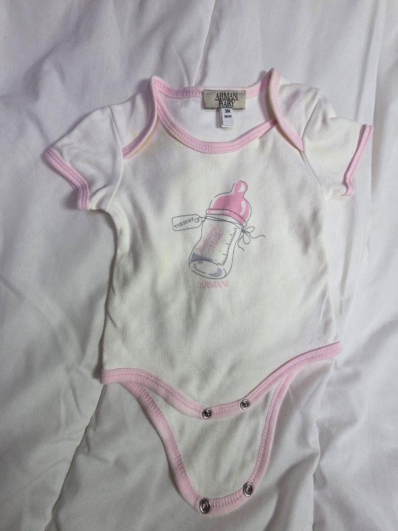 Armani Baby Onesie 3M (Category: Babies & Kids Fashion) located in Manila. Submitted by mamaloved08 (Listing ID 1434076172, Image 2). Description: Original Armani Baby onesie. Has a slight yellow stain and the wash tag was removed. Very comfy for your little one. Armani Baby onesie - White with pink trim - Size: 3M - Cute baby bottle graphic - Soft, comfortable fabric - Snap closures for easy changes.