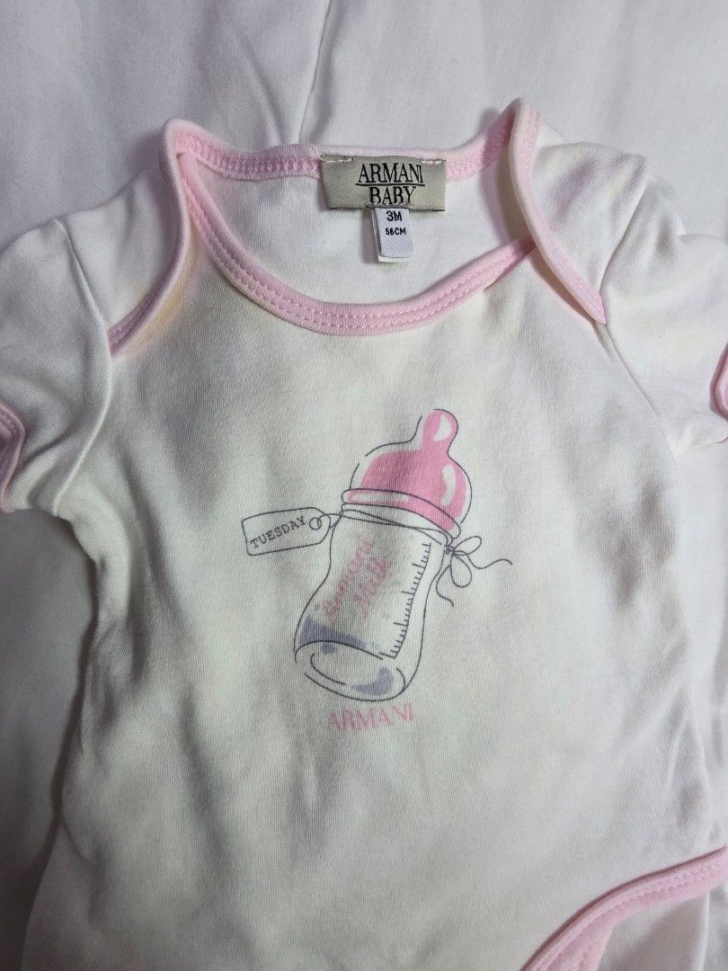 Armani Baby Onesie 3M (Category: Babies & Kids Fashion) located in Manila. Submitted by mamaloved08 (Listing ID 1434076172, Image 3). Description: Original Armani Baby onesie. Has a slight yellow stain and the wash tag was removed. Very comfy for your little one. Armani Baby onesie - White with pink trim - Size: 3M - Cute baby bottle graphic - Soft, comfortable fabric - Snap closures for easy changes.