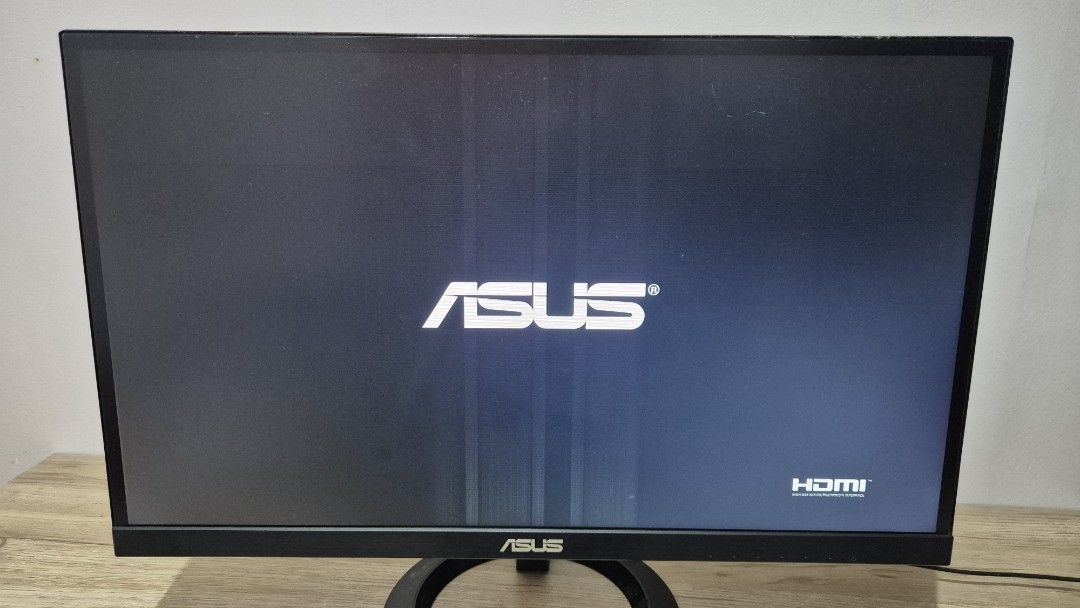 Asus 24" flat monitor (Category: Monitor Screens) located in Pasig City. Submitted by flina.14 (Listing ID 1433994098, Image 1). Description: defect shown on pic. monitor is working but screen has lines already..