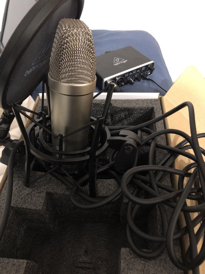 Behringer Microphone Audio Interface (Category: Other Audio Equipment) located in Kuala Lumpur. Submitted by maxluis (Listing ID 1434136016, Image 1). Description: - Behringer UMC202HD audio interface and TM1 microphone set. - Includes: UMC202HD audio interface (2 inputs), TM1 large-diaphragm condenser microphone, pop filter, and shock mount. - Audio interface features gain controls and monitoring options. - Ideal for home recording and content c