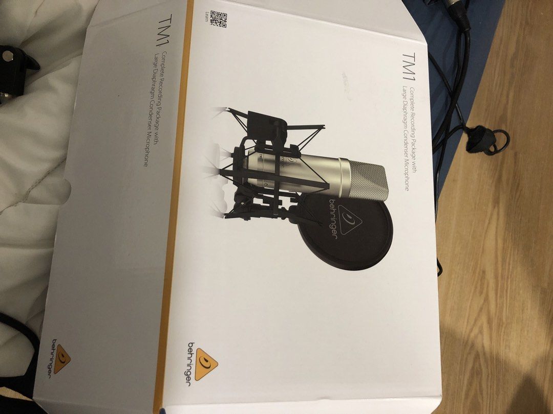 Behringer Microphone Audio Interface (Category: Other Audio Equipment) located in Kuala Lumpur. Submitted by maxluis (Listing ID 1434136016, Image 3). Description: - Behringer UMC202HD audio interface and TM1 microphone set. - Includes: UMC202HD audio interface (2 inputs), TM1 large-diaphragm condenser microphone, pop filter, and shock mount. - Audio interface features gain controls and monitoring options. - Ideal for home recording and content c