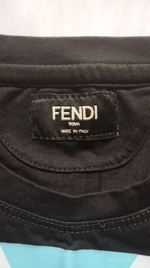 Black Fendi-Inspired Monster Eye Tee (Category: Babies & Kids Fashion) located in Los Banos. Submitted by wise-fox27 (Listing ID 1434027658, Image 2). Description: Give him a high-fashion edge with this black graphic tee featuring the iconic "monster eyes" design in a cool blue gradient. Sleek, comfortable, and perfect for a mini-streetwear look. Condition: Preloved Style: Streetwear / Designer Inspired Measurement: Chest: 13.5in Length: 17.5in T