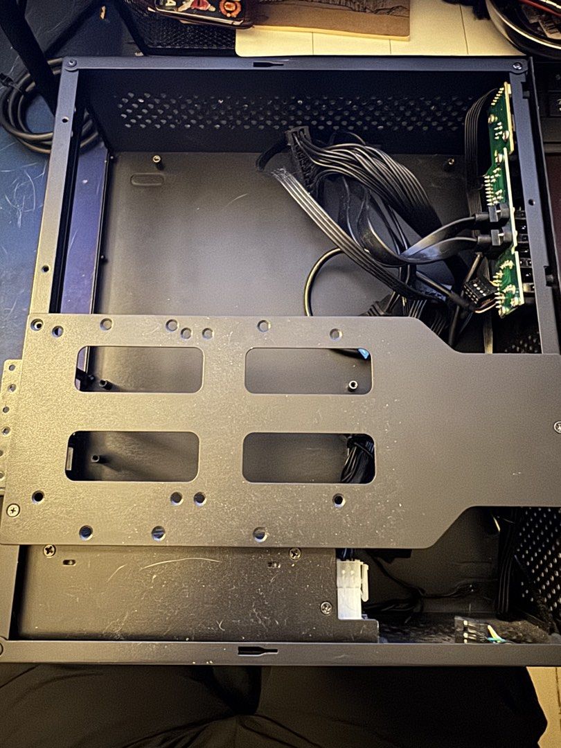Black PC Case (Category: Computer Parts) located in Subang Jaya. Submitted by mrkerusi (Listing ID 1434138363, Image 2). Description: - Black PC case - Perforated front panel for improved airflow - Front-facing ports: audio, USB, power button - Includes PSU - Internal mounting brackets - Clean, minimalist design.