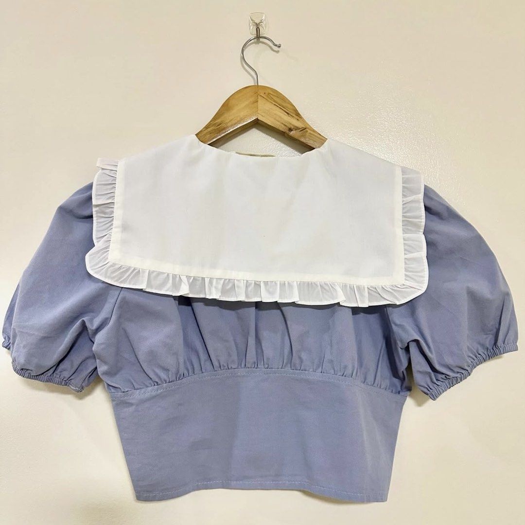Blue Puff Sleeve Crop Top with White Collar (Category: Blouses) located in General Santos City (Dadiangas). Submitted by thekeycloline (Listing ID 1434124332, Image 2). Description: Color: Blue, White Size: XS-S Fabric: Cotton.