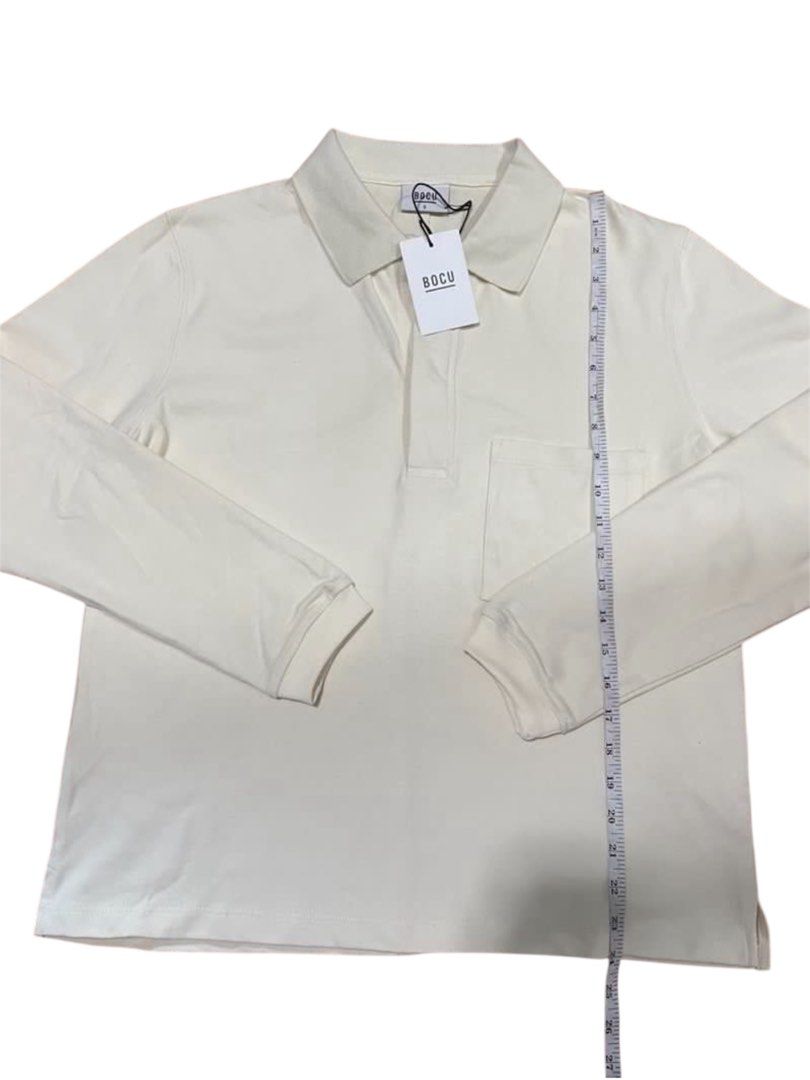 BOCU Long Sleeve Polo Shirt (Category: Tshirts & Polo Shirts ) located in Manila. Submitted by commonselection (Listing ID 1434091119, Image 3). Description: Bocu Off white / Light yellow Small 26x21 SRP - 1,999 Rfs Decluttering.