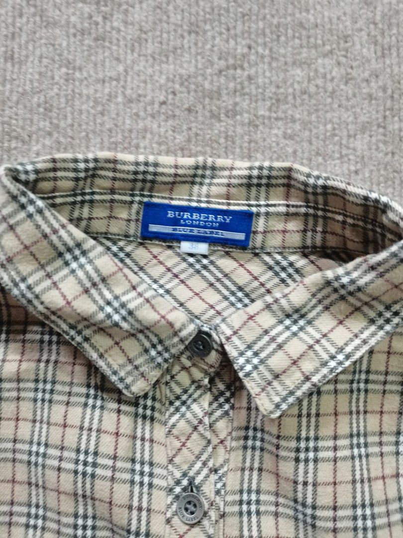 Burberry blue label 3/4 sleeve polo (Category: Longsleeves) located in Apalit. Submitted by _doer (Listing ID 1433990142, Image 2). Description: Size 38 No flaws 1k or best offer.