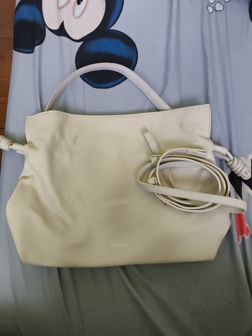 BOSTANTEN Cream Handbag with Shoulder Strap (Category: Luxury Bags & Wallets) located in Manila. Submitted by ad002021 (Listing ID 1434040955, Image 1). Description: Cream-colored handbag with detachable strap. Features top handle, knotted sides, and a dark interior. removable marks. 💚Bundle deals available—Willing to negotiate fairly if buying multiple items from my other listings ☺️ 🙏🏼I’m open to reasonable offers—happy to haggle a bit so we