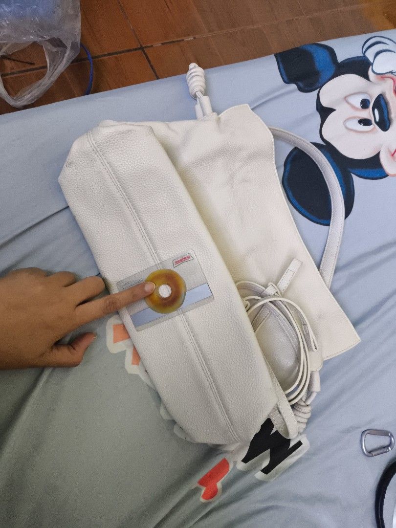 BOSTANTEN Cream Handbag with Shoulder Strap (Category: Luxury Bags & Wallets) located in Manila. Submitted by ad002021 (Listing ID 1434040955, Image 3). Description: Cream-colored handbag with detachable strap. Features top handle, knotted sides, and a dark interior. removable marks. 💚Bundle deals available—Willing to negotiate fairly if buying multiple items from my other listings ☺️ 🙏🏼I’m open to reasonable offers—happy to haggle a bit so we