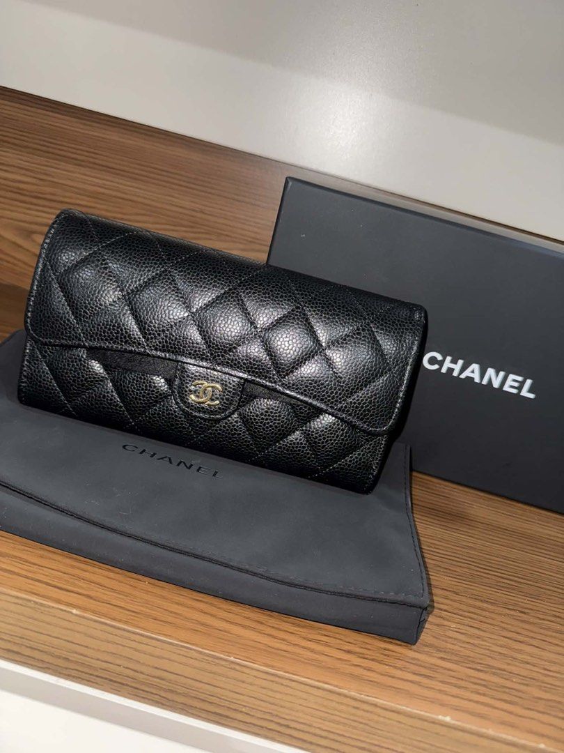 Chanel Classic Flap Wallet Black Caviar Leather (Category: Luxury Bags & Wallets) located in Manila. Submitted by llhflnc888 (Listing ID 1434017467, Image 3). Description: - Authentic Chanel Classic Flap Wallet - Year 2024 bought & stored after - Black caviar leather - Iconic diamond quilting - CC magnet closure - Includes original box and dust bag - Multiple card slots and compartments - Timeless and elegant design - Good as new!.