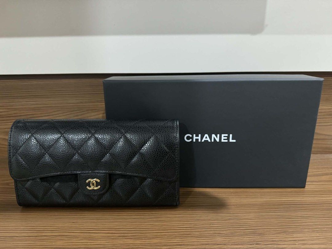 Chanel Classic Flap Wallet Black Caviar Leather (Category: Luxury Bags & Wallets) located in Manila. Submitted by llhflnc888 (Listing ID 1434017467, Image 1). Description: - Authentic Chanel Classic Flap Wallet - Year 2024 bought & stored after - Black caviar leather - Iconic diamond quilting - CC magnet closure - Includes original box and dust bag - Multiple card slots and compartments - Timeless and elegant design - Good as new!.