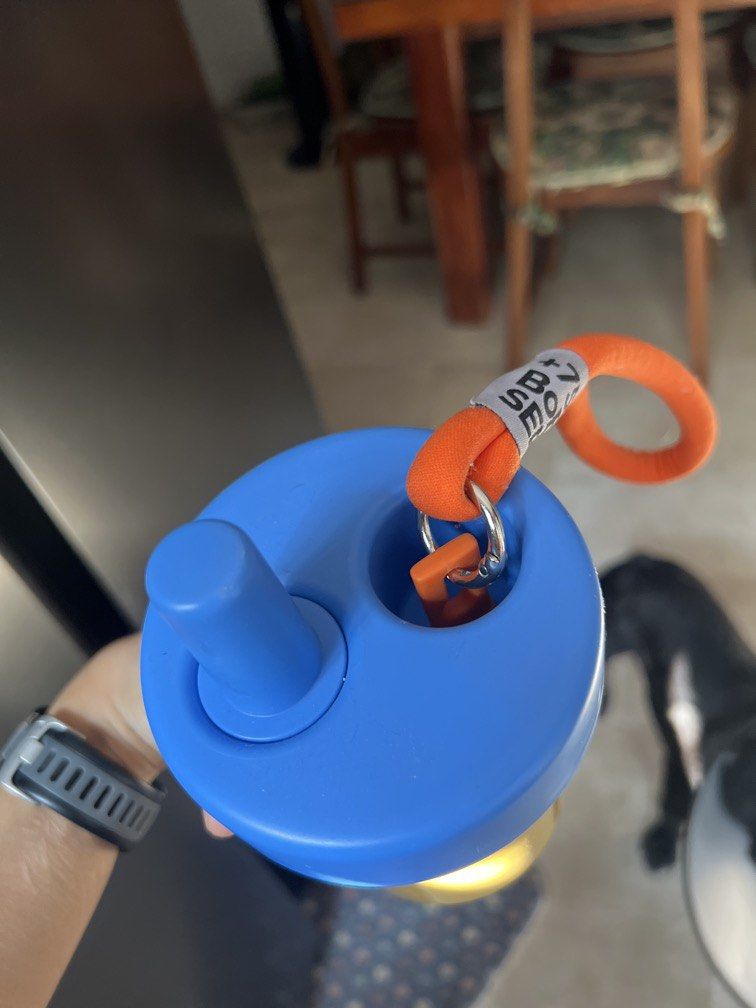 Chako Lab Water Bottle with Straw (Category: Water Bottles & Tumblers) located in Manila. Submitted by tjsells.101 (Listing ID 1434000836, Image 3). Description: - Choko Lab water bottle - Bright yellow body - Blue lid and straw - Convenient orange carrying strap - Removal sticker with small dent .