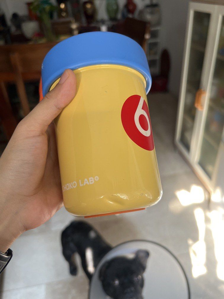 Chako Lab Water Bottle with Straw (Category: Water Bottles & Tumblers) located in Manila. Submitted by tjsells.101 (Listing ID 1434000836, Image 1). Description: - Choko Lab water bottle - Bright yellow body - Blue lid and straw - Convenient orange carrying strap - Removal sticker with small dent .