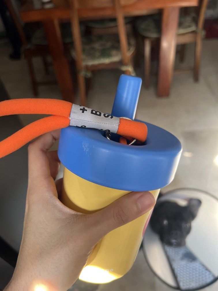 Chako Lab Water Bottle with Straw (Category: Water Bottles & Tumblers) located in Manila. Submitted by tjsells.101 (Listing ID 1434000836, Image 2). Description: - Choko Lab water bottle - Bright yellow body - Blue lid and straw - Convenient orange carrying strap - Removal sticker with small dent .