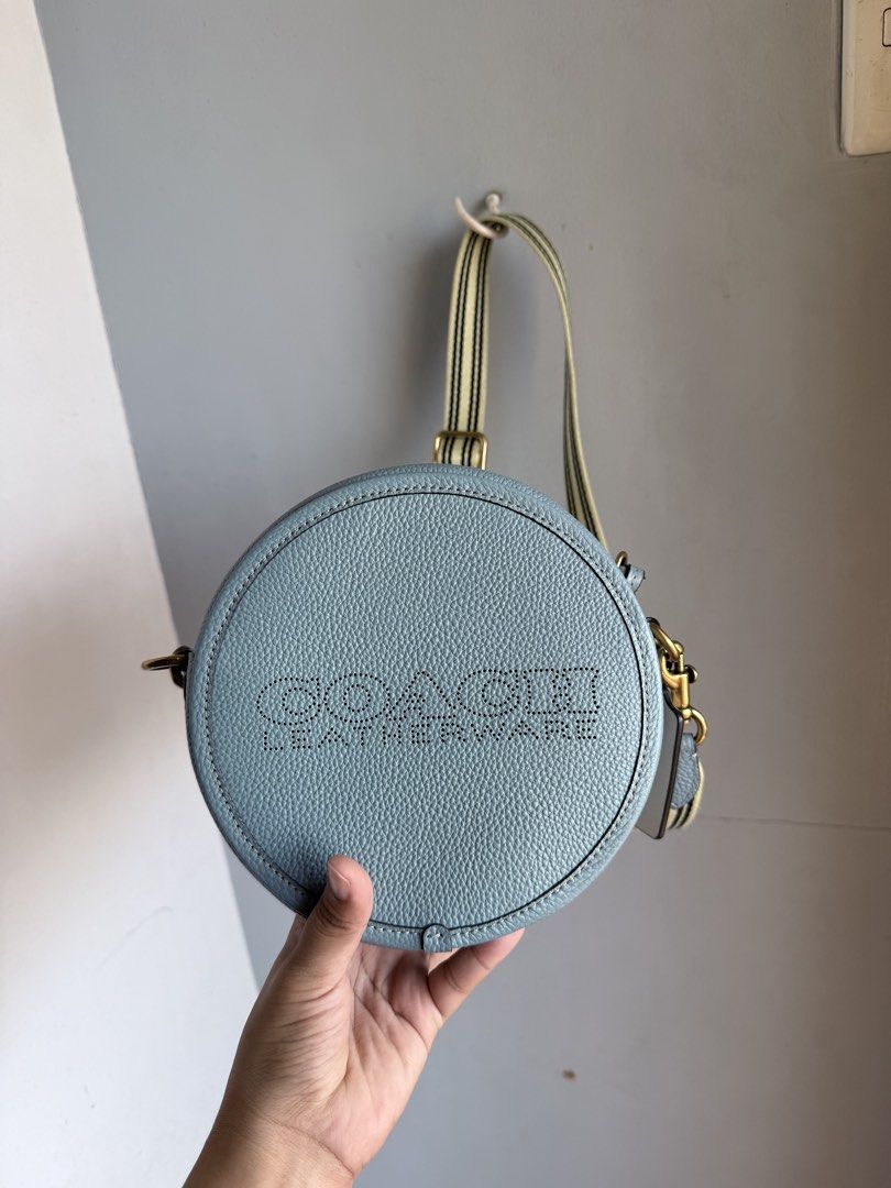 Coach Leatherware Round Crossbody Bag light blue (Category: Cross-body Bags) located in Paranaque City. Submitted by jarediniiiee (Listing ID 1434056201, Image 1). Description: - Dimensions: Approximately 8 inches diameter x 3 inches width.