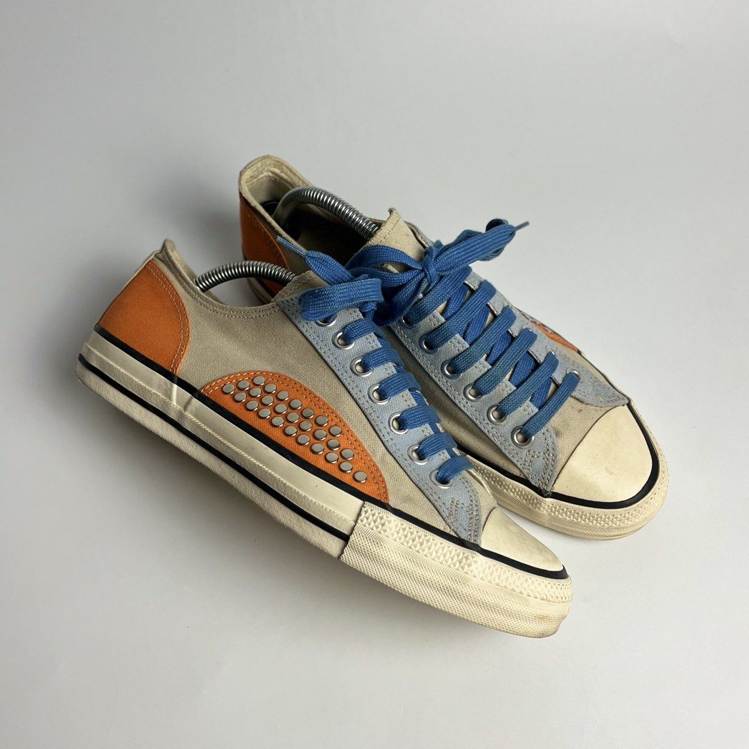 COMME des GARÇONS Homme Plus Studded Canvas Sneakers (Category: Sneakers) located in Manila. Submitted by streetsavvy (Listing ID 1434089608, Image 1). Description: COMME des GARÇONS Homme Plus Studded Canvas Sneakers Size: Japan 26.0 (Fits like a US 8 - 8.5) Made in Japan These are a quintessential example of CDG Homme Plus’s approach to footwear: taking a familiar silhouette and completely subverting it through heavy-duty hardware and unique pa