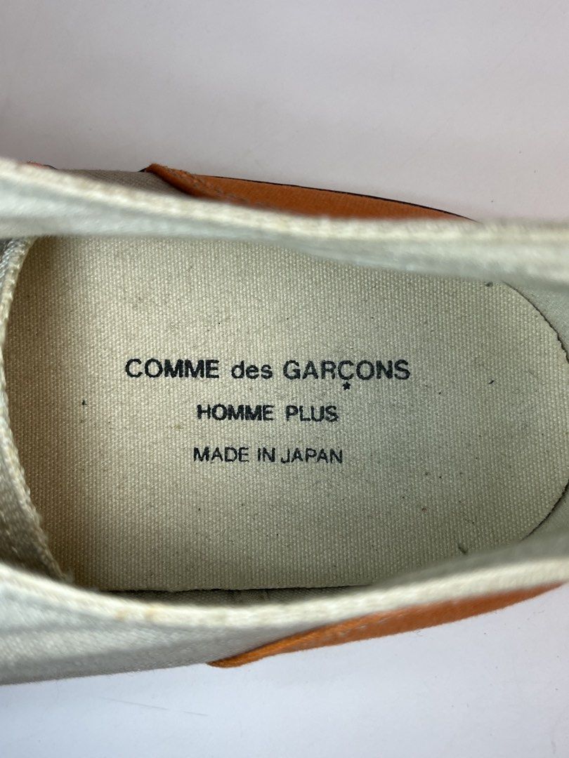 COMME des GARÇONS Homme Plus Studded Canvas Sneakers (Category: Sneakers) located in Manila. Submitted by streetsavvy (Listing ID 1434089608, Image 3). Description: COMME des GARÇONS Homme Plus Studded Canvas Sneakers Size: Japan 26.0 (Fits like a US 8 - 8.5) Made in Japan These are a quintessential example of CDG Homme Plus’s approach to footwear: taking a familiar silhouette and completely subverting it through heavy-duty hardware and unique pa