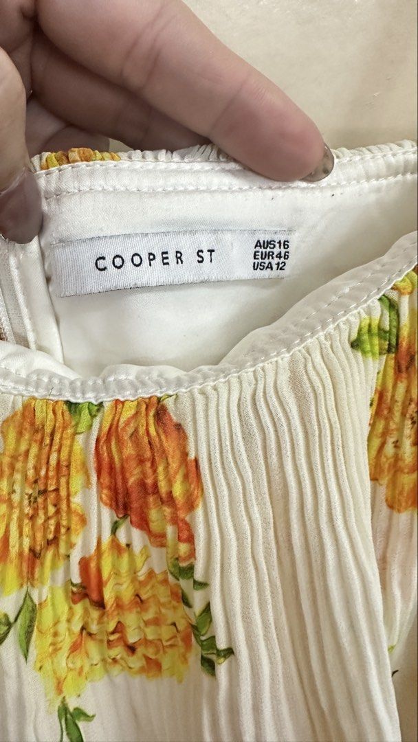 Cooper St Floral Dress (Category: Dresses) located in Malabon City. Submitted by xeniag (Listing ID 1434073177, Image 2). Description: - Cooper St. floral dress - Features a white base with yellow and orange floral print - Layered design with spaghetti straps - Size: AUS16, EUR46, USA 12 - Ideal for summer outings.