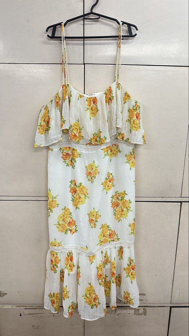 Cooper St Floral Dress (Category: Dresses) located in Malabon City. Submitted by xeniag (Listing ID 1434073177, Image 1). Description: - Cooper St. floral dress - Features a white base with yellow and orange floral print - Layered design with spaghetti straps - Size: AUS16, EUR46, USA 12 - Ideal for summer outings.