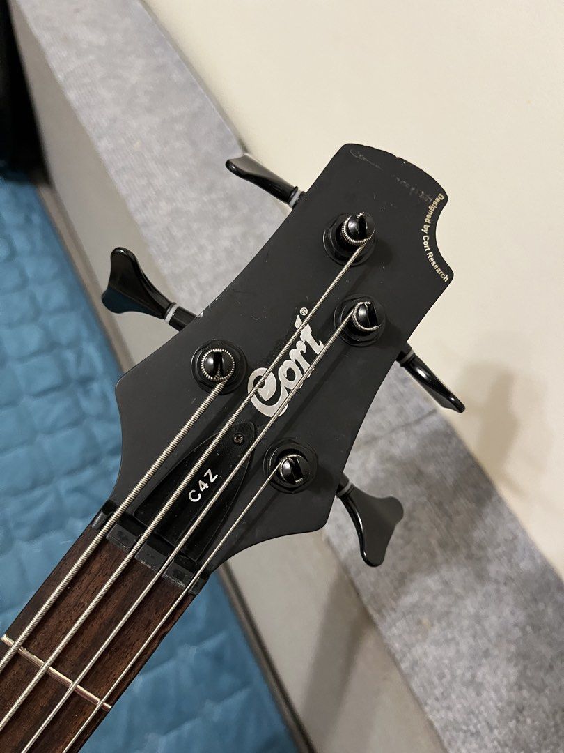 Cort C4Z Bass Guitar (Category: Musical Instruments) located in Cainta. Submitted by caleb0727 (Listing ID 1434148827, Image 3). Description: LOCATION: GREENLAND SUBD, CAINTA PICK UP OR SHIPPING ONLY! PRICE: 13k FIXED •Cort C4Z Bass Guitar 13k FIXED -made in Indonesia -stock pickups -upgraded preamp with 3 band eq -fresh strings -basic setup done -my mga scratches and dents lang so manage your expectations -bass only, no bag.
