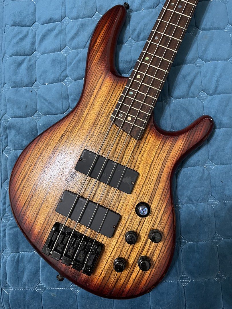 Cort C4Z Bass Guitar (Category: Musical Instruments) located in Cainta. Submitted by caleb0727 (Listing ID 1434148827, Image 2). Description: LOCATION: GREENLAND SUBD, CAINTA PICK UP OR SHIPPING ONLY! PRICE: 13k FIXED •Cort C4Z Bass Guitar 13k FIXED -made in Indonesia -stock pickups -upgraded preamp with 3 band eq -fresh strings -basic setup done -my mga scratches and dents lang so manage your expectations -bass only, no bag.