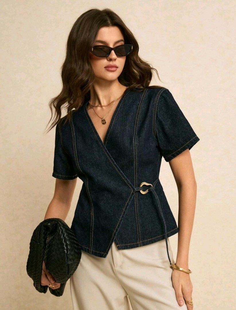 Denim Wrap Top with Belt Detail (Category: Others Tops) located in Manila. Submitted by sasaweee (Listing ID 1434147482, Image 1). Description: Brand new. please buy niyo na po kasi gusto kong bilhin yung bigger size nito. ang ganda po kasi nito super kaya lang wrong size ang na click ko sa Shein. rfs: I got the wrong size -V neckline and short sleeves - Unique wrap design with belt - Dark wash denim - Perfect for a chic, casual look.