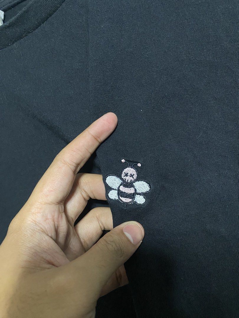 Dior Bee Embroidery T-shirt - Black - Medium (Category: Tshirts & Polo Shirts ) located in Naga. Submitted by thesource4400 (Listing ID 1433994306, Image 2). Description: - Black Dior T-shirt - Features bee embroidery on chest - Size: Medium - Material: Cotton-polyester blend - Design: Classic crew neck - Condition: Good.