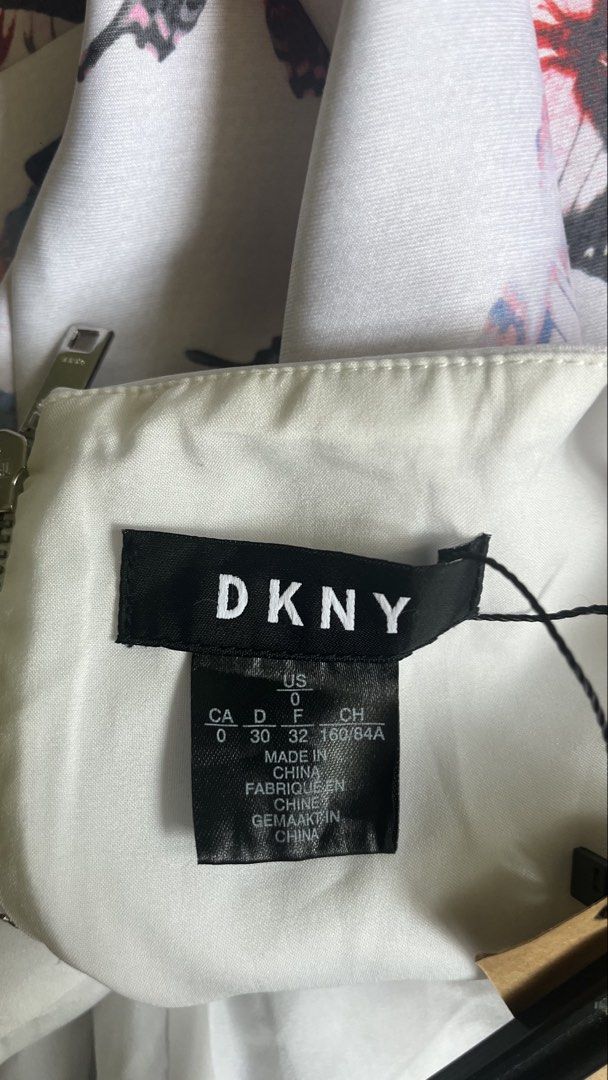 DKNY Butterfly Print Dress (Category: Dresses) located in Pasig City. Submitted by detneedsmoney (Listing ID 1434029078, Image 2). Description: - DKNY dress - Butterfly print - Cold shoulder design.