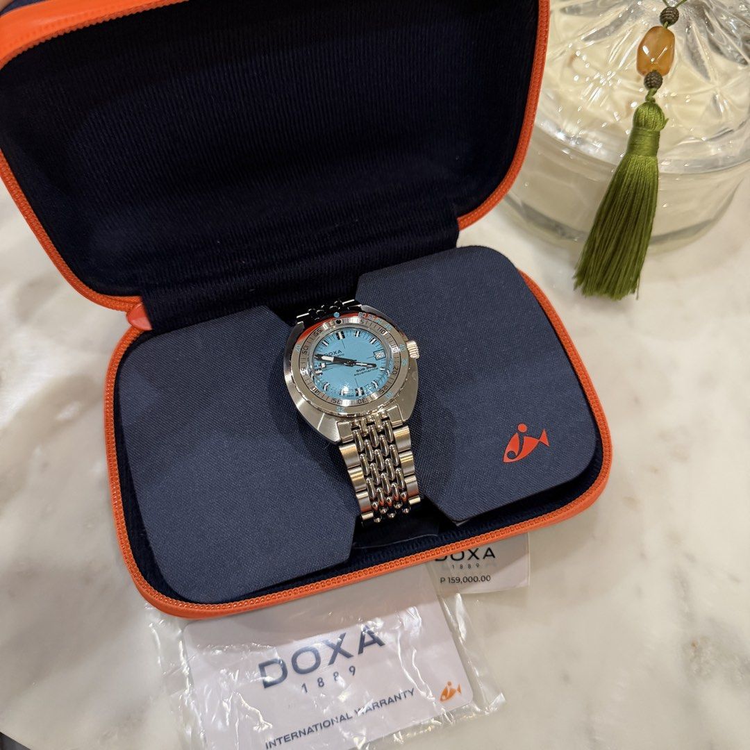 Doxa 1889 Sub 200T Caribbean (Category: Luxury Watches) located in Quezon City. Submitted by prebyp (Listing ID 1434032741, Image 2). Description: - Doxa 1889 Sub 200T Caribbean watch - Light blue dial - Stainless steel bracelet - Includes original box - Includes warranty card - Includes protective case - Unique bezel design.