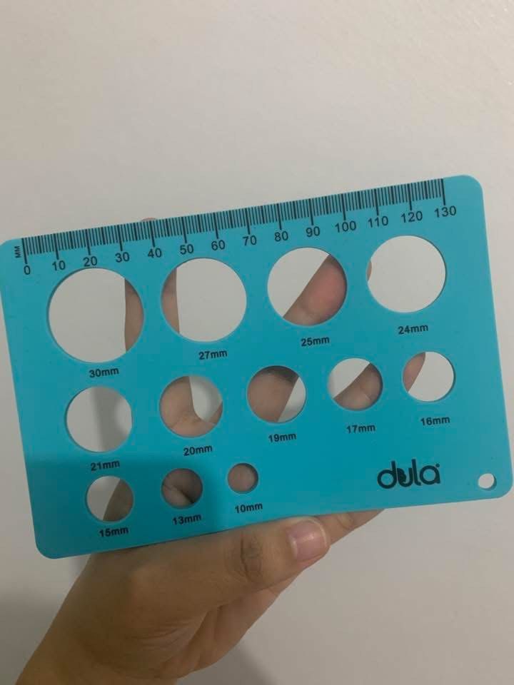 Dula Silicone Ruler for🤱🏻Pump Flange (Category: Craft Supplies & Tools) located in Angeles City. Submitted by jowieee28 (Listing ID 1434013846, Image 1). Description: - Dula Circle Template - Teal plastic material - Circle sizes: 10mm to 30mm - Integrated ruler along top edge (0-130mm).