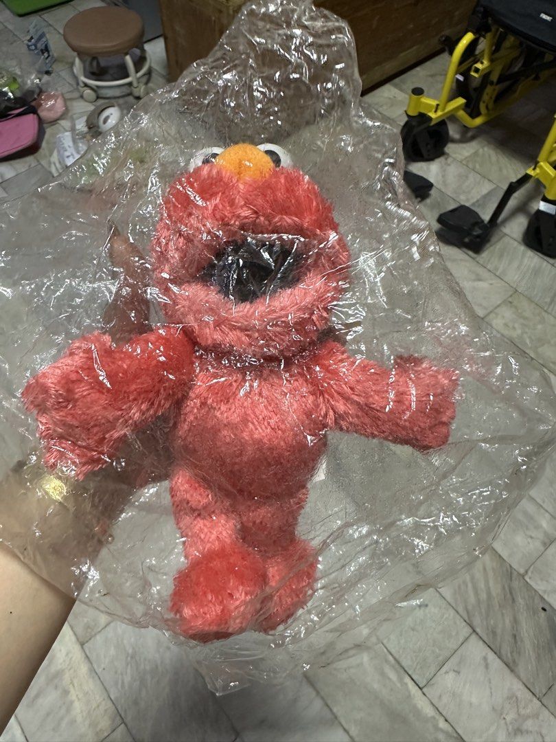 Elmo Plush Toy (Category: Plushies & Soft Toys) located in Manila. Submitted by salmongirl88 (Listing ID 1433986534, Image 2). Description: - Elmo plush toy - Red body - Orange nose - Big eyes - Soft and cuddly - Comes in a plastic bag - Great gift for kids.