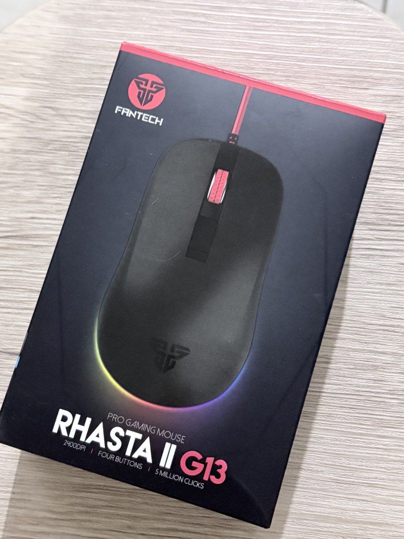 Fantech Rhasta II G13 Pro Gaming Mouse (Category: Mouse & Mousepads) located in Taguig. Submitted by ssamlovesu (Listing ID 1434117598, Image 1). Description: - Fantech Rhasta II G13 Pro Gaming Mouse - 2400 DPI - 4 Buttons - 5 Million Clicks - Sleek Black Design - Colorful Light Strip - Pro Gaming Mouse mod : lalamove / jnt mop : Gcash / Maribank / Maya loc : Ugong, Pasig rfs : brand new gift .