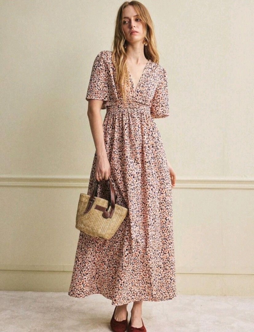 Floral Print Maxi Dress (Category: Dresses) located in Antipolo. Submitted by secondbloomph (Listing ID 1434013178, Image 1). Description: - Floral maxi dress - V-neckline - Short flutter sleeves - Fitted waist - Flowing skirt - Pink, black, and white floral print - Great for casual or special events.