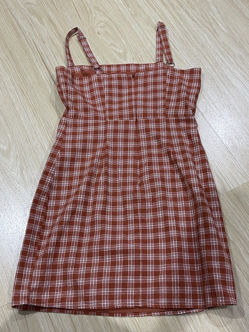 Forever 21 Plaid Mini Dress - Size M (Category: Dresses) located in Quezon City. Submitted by meg_clothes (Listing ID 1434071442, Image 2). Description: - Forever 21 mini dress - Size: M - Pattern: Orange and white plaid - Features: Adjustable straps, back zipper - Made in Vietnam.