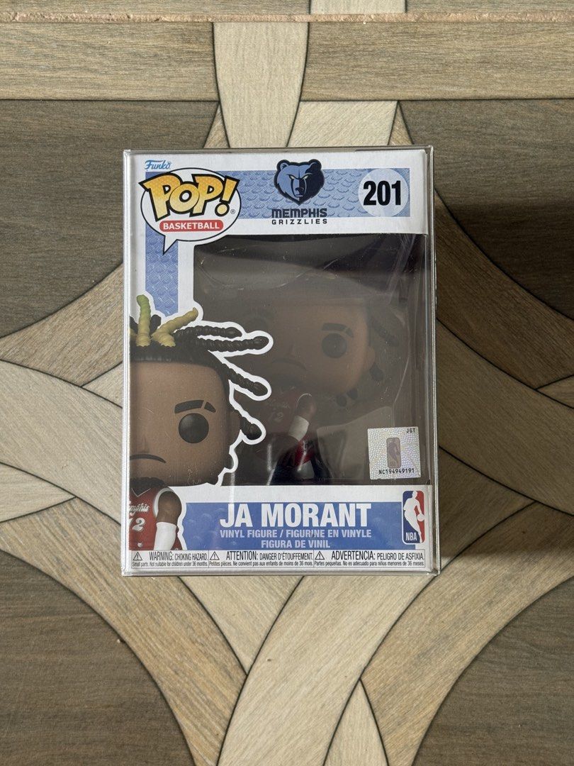 Funko Pop! Basketball Ja Morant #201 (Category: Designer & Blind Box Toys) located in Manila. Submitted by black_swoosh04 (Listing ID 1434001050, Image 1). Description: - Funko Pop! figure of Ja Morant from the Memphis Grizzlies. - NBA Series #201. - Vinyl figure. - Brand new, in original packaging. - Features Funko Pop! and NBA logos on the box. - Box includes images of other figures in the series..