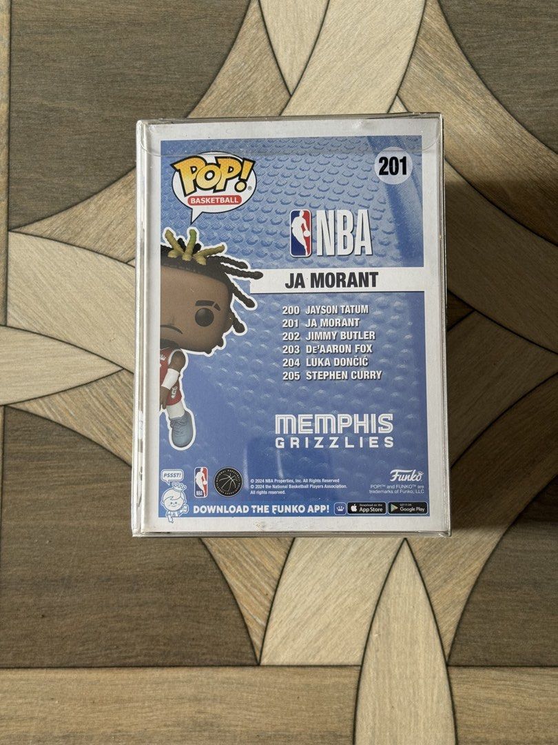 Funko Pop! Basketball Ja Morant #201 (Category: Designer & Blind Box Toys) located in Manila. Submitted by black_swoosh04 (Listing ID 1434001050, Image 3). Description: - Funko Pop! figure of Ja Morant from the Memphis Grizzlies. - NBA Series #201. - Vinyl figure. - Brand new, in original packaging. - Features Funko Pop! and NBA logos on the box. - Box includes images of other figures in the series..