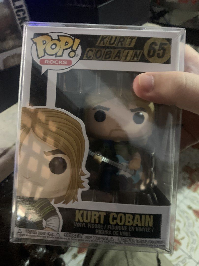 Funko Pop! Rocks Kurt Cobain #65 (Category: Designer & Blind Box Toys) located in Manila. Submitted by robertzombie (Listing ID 1434029364, Image 1). Description: - Funko Pop! Rocks figure of Kurt Cobain. - Number 65 in the Pop! Rocks series. - Depicts Kurt Cobain with a guitar. - Brand new in original packaging. - Box shows figure from multiple angles. 09153896941 e4.