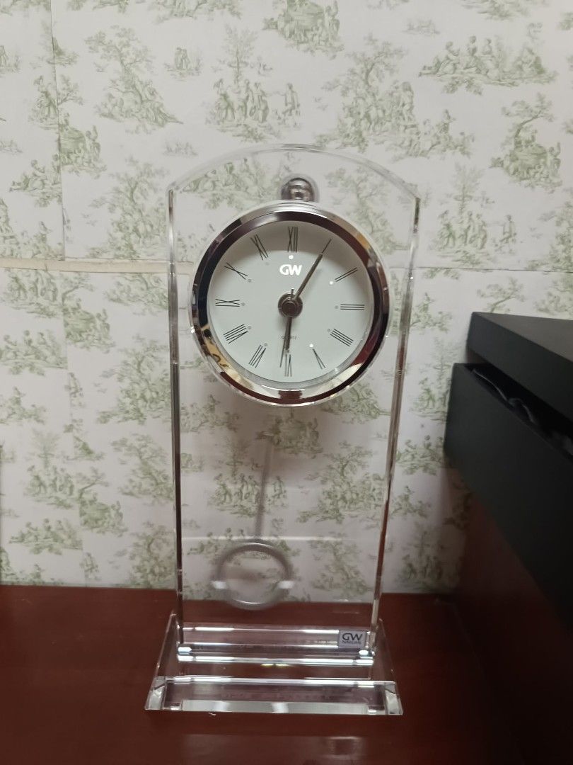 Glass Works Narumi Table Clock (Category: Clocks) located in Caloocan City. Submitted by chonadura91470 (Listing ID 1433977113, Image 2). Description: - Elegant Narumi table clock - Clear glass frame - Silver-toned clock face - Roman numeral hour markers brand-new with box - Narumi brand logo - Includes original box - Comes with paperwork - Perfect for desks or shelves.