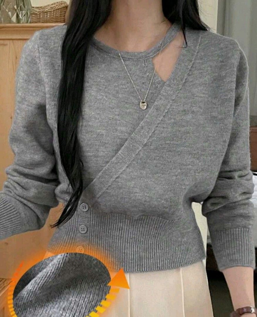 Gray Cutout Sweater (Category: Longsleeves) located in Taguig. Submitted by chicstyle (Listing ID 1434029391, Image 1). Description: - Gray sweater - Cutout neckline - Wrap-style design - Long sleeves - Ribbed hem - Button closure - Soft knit material.