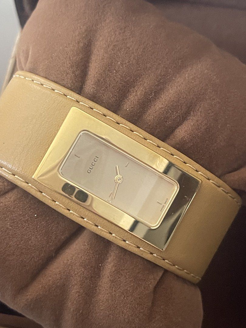 Gucci Ladies Watch 7800 S (Category: Women's Watches) located in Cavite. Submitted by authenticfindsbyging (Listing ID 1434047623, Image 3). Description: - Authentic Gucci ladies watch - Gold-tone rectangular watch face - Features the Gucci logo - Tan leather strap - Gold-tone clasp - Comes with original Gucci box - Model number: 7800 S - Water resistant.