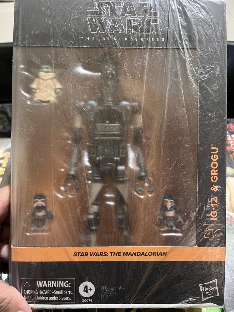 Hasbro Star Wars The Black Series IG-12 & Grogu action figure set (Category: Figurines & Statues) located in Manila. Submitted by bazaarmom (Listing ID 1434070183, Image 1). Description: - Star Wars Black Series action figure set - Features IG-12 and Grogu from The Mandalorian - Includes IG-12 figure - Includes two Grogu figures - Collectible item for Star Wars fans - Packaging includes small parts warning - Suitable for ages 4 and up.